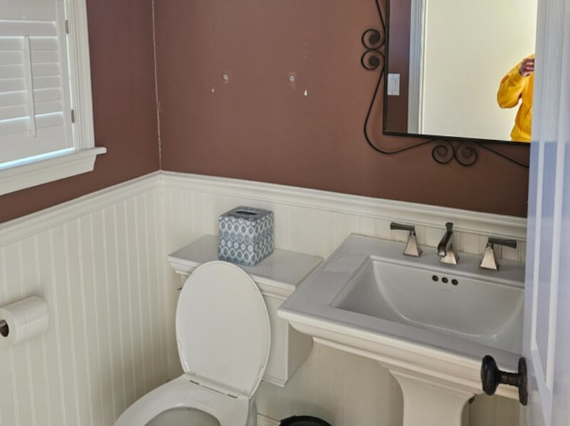 before picture of a powder room
